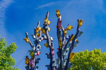 tree with colorful birdhouses in Riga, Latvia