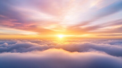 Fototapeta premium Stunning sunset view above the clouds, showcasing vibrant colors and a serene atmosphere of natural beauty.
