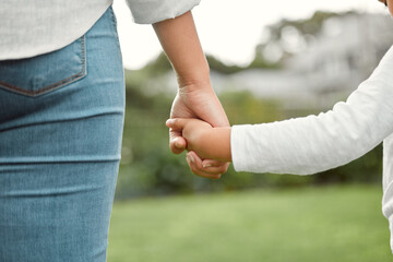 Holding hands, love and parent with child, outdoor and bonding of family on walk, park and together. Care, person and kid in nature for fresh air, back and mother with affection for daughter or break