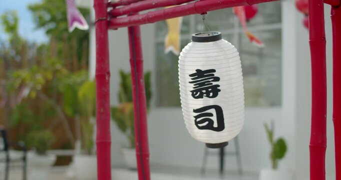 Japanese lantern.Japanese lanterns are a common decoration for coffee shops in Thailand.White Japanese lanterns reflect sunlight.