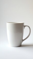 Fototapeta premium White mug standing on a white background