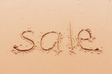 inscription sale on the seashore with palm trees