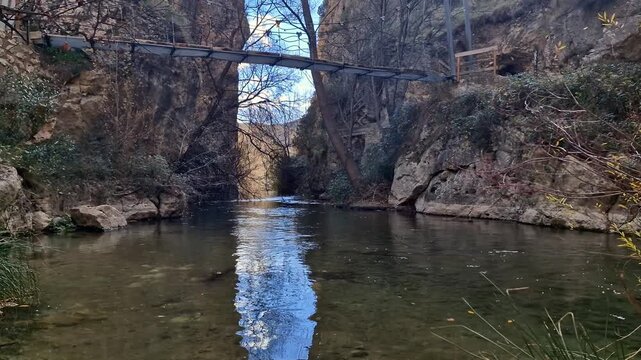 A river in an autumn park in a Spanish village.