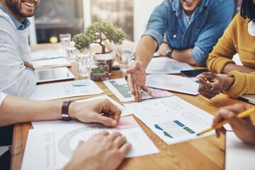 Business people, hands and graphs of copywriter team meeting with SEO data for website content...