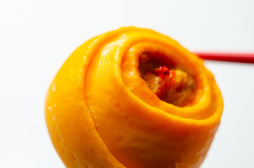 A piece of food with a red star on it