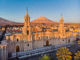 Naklejka premium aerial view of the cathedral of Arequipa and the Misti volcano at sunset
