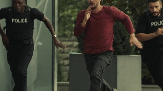 Bald Fugitive running away from the police in the city