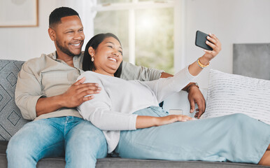 Couple, phone and selfie for memory in home, camera app and relax in husband embrace for profile picture. People, couch love and social media post on date in apartment, weekend romance and happiness