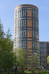 Modern architectural complex with cylindrical building