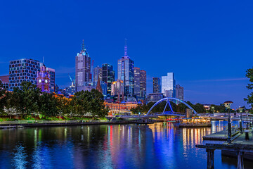 Melbourne skyline with a view of Flinders Street Station at night, Australia.