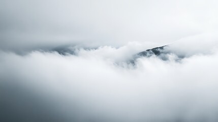 Obraz premium Serenity in Motion - Minimalist Conceptual Photograph of Dreamy Misty Clouds Rolling on Gray Background