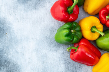 Fresh sweet bell pepper ( paprika ) photography red , green and yellow . Colorful vegetable . Top view