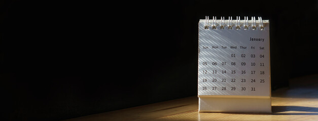 Calendar desk placed on business table. Desktop Calender for Planner to plan agenda, timetable, appointment, organization, management each date, month, and year on office table-ฺbanner