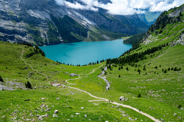 Hiking trail along the Oeschinensee Lake hike in Switzerland