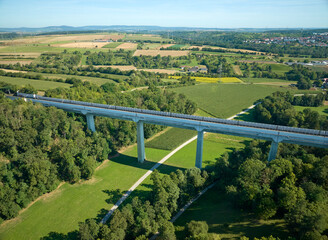 Obraz premium aerial view on a railroad viaduct in the course of the high speed express train route between Stuttgart and Mannheim, Baden Wuerttemberg Germany