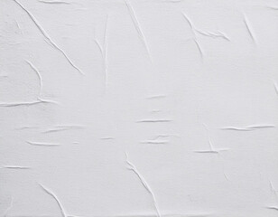 Blank white crumpled and creased paper poster texture background	