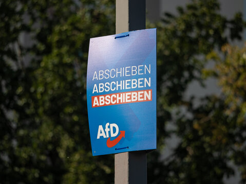DRESDEN, GERMANY - 21. August 2024: AfD election campaign poster with the slogan "Abschieben" (deportation) in East Germany. The far right political party is xenophobic and populist.
