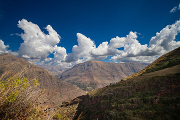 Spectacular View of Sacred Valley in Andes Mountains near town Pisac, Dramatic Sunny Summer Day,...
