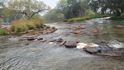 The river kaveri at the Dubare elephant camp at Dubare, Kodagu district, Karnataka, India. People used to cross this river by walk during low level of water to visit elephant camp. 
