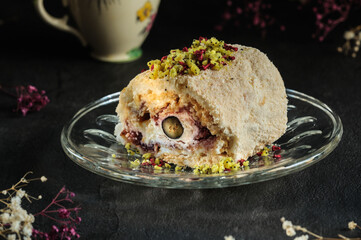 Close-up of meringue roll on a plate