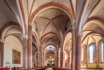 Fototapeta premium Asti, Italy - August 20, 2024: San Secondo collegiate church ( 7th century; 10th; 15th ), Gothic style interior architecture, is the oldest church in Asti