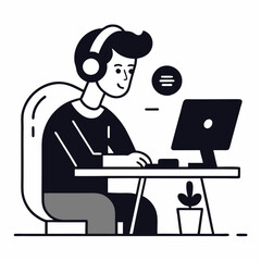 A man is sitting at a desk and working on a computer