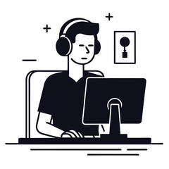 A man is sitting at a desk and working on a computer