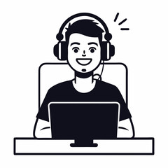 A man is sitting at a desk and working on a computer