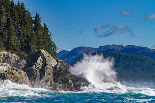 Waves crashing against the shore in Cross Sound, Southeast Alaska, United States of America