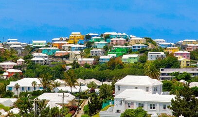 Bermuda skyline with the traditional pastel coloured houses with stepped roofs to catch the rain, Bermuda