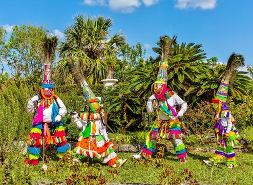 Gombey dancers, traditional performers, in troupes of 10 to 20, of a blend of Native American, Caribbean and British culture, dancing to a powerful drum beat, Bermuda