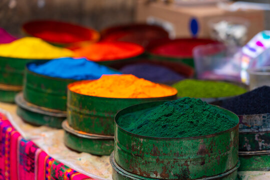 Close-up of colorful powdered pigments used as natural textile dye, Pisac market, Pisac, Sacred Valley, Urubamba Province, Cusco (Cuzco) Region, Peru