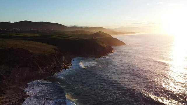 "Drone Footage of Sunset Over Tagle Beach, Spain"