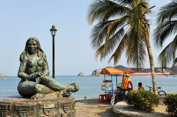 Monument depicting indigenous Tairona people on the seaside promenade of Santa Marta, department of Magdalena, Caribbean Region, Colombia