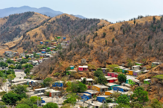Colorful houses in a poor area on the hillside around Santa Marta, department of Magdalena, Caribbean Region, Colombia