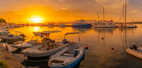 View of boats in Old Port Marina at sunset, Corfu, Ionian Sea, Greek Islands, Greece