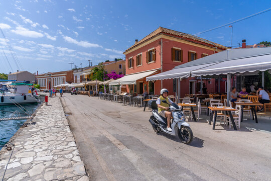 View of cafes in the harbour in Gaios Town, Paxos, Ionian Sea, Greek Islands, Greece