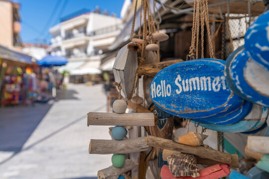 View of Hello Summer sign and souvenirs in Thassos Town, Thassos, Aegean Sea, Greek Islands, Greece