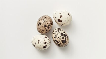 Obraz premium Quail eggs on a white background