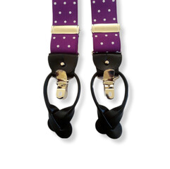 purple mens suspenders with white dot  for trousers with metal clips isolated on white background