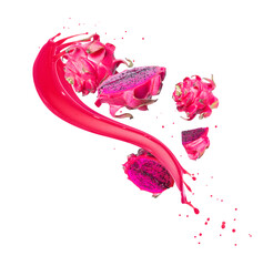 Whole and sliced ​​dragon fruits in juice splashes isolated on a white background