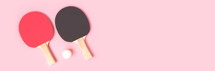 Banner with tennis rackets and white ball on a pink background. Place for text.