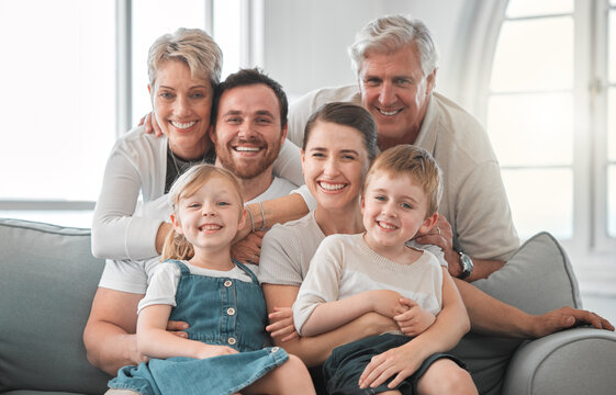 Living room, portrait and big family with children on sofa for weekend fun, enjoyment and bonding together. Parents, happy and relax with generations at home for support, connection and love of kids