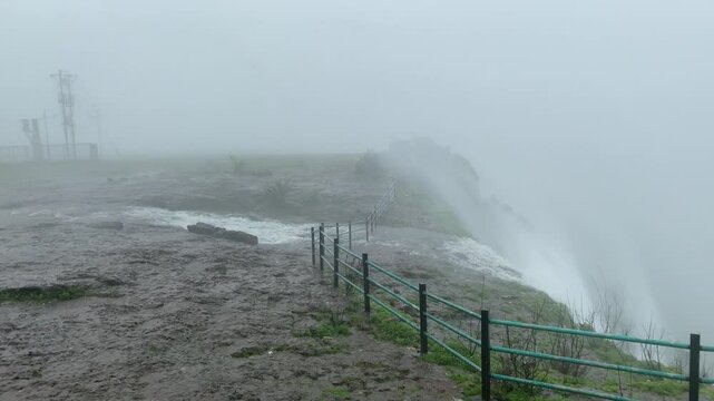 reverse waterfall observed during extremely heavy rains at patan plateau near koynanagar in Konkan, Maharashtra, India