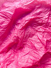 Pink crumpled paper background, backing, backdrop for creativity