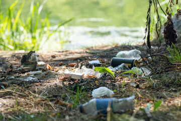 Illegal garbage dump in nature. Dirty garbage polluting the environment