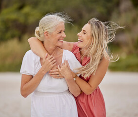 Laugh, beach and senior mom with daughter for happy bonding holiday, love and embrace on weekend travel. Nature, mother and mature woman on ocean adventure together with hug, fun and island vacation.
