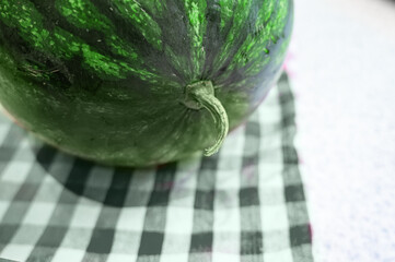 Close-up of watermelon on table with copy space