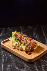 Enjoy a Delicious Lettuce Wrap with Tasty Toppings and Sauce, Perfect for Any Meal