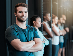 Fitness, happy man and confident in gym class for portrait, wellness and ready for physical...